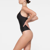 SKIMS BODY PUSH-UP THONG BODYSUIT | ONYX