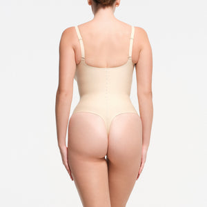 SKIMS BODY CORE SCULPT PLUNGE THONG BODYSUIT | SAND