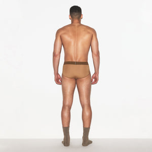 SKIMS COTTON MENS BRIEF | RUSSET