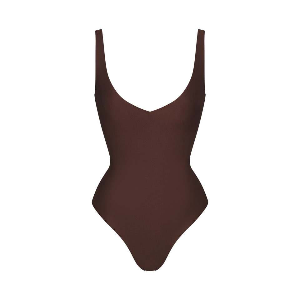 SKIMS BODY UNLINED PLUNGE THONG BODYSUIT | COCOA