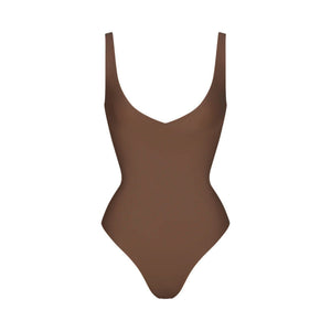 SKIMS BODY UNLINED PLUNGE THONG BODYSUIT | JASPER