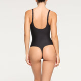 SKIMS BODY UNLINED PLUNGE THONG BODYSUIT | ONYX